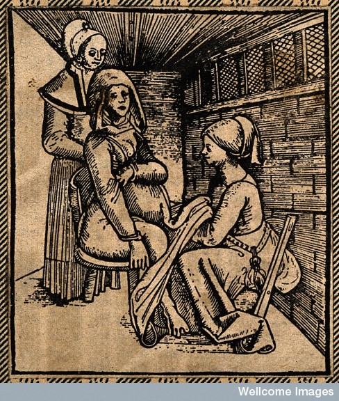  A woman seated on a obstetrical chair giving birth aided by Credit: Wellcome Library, London. Wellcome Images images@wellcome.ac.uk 